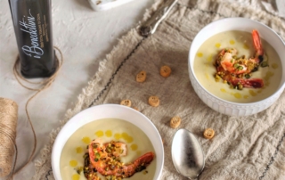 Potage parmentier e gamberi in crosta di pistacchi con olio extravergine di oliva Azienda Olivicola I Benedettini 1